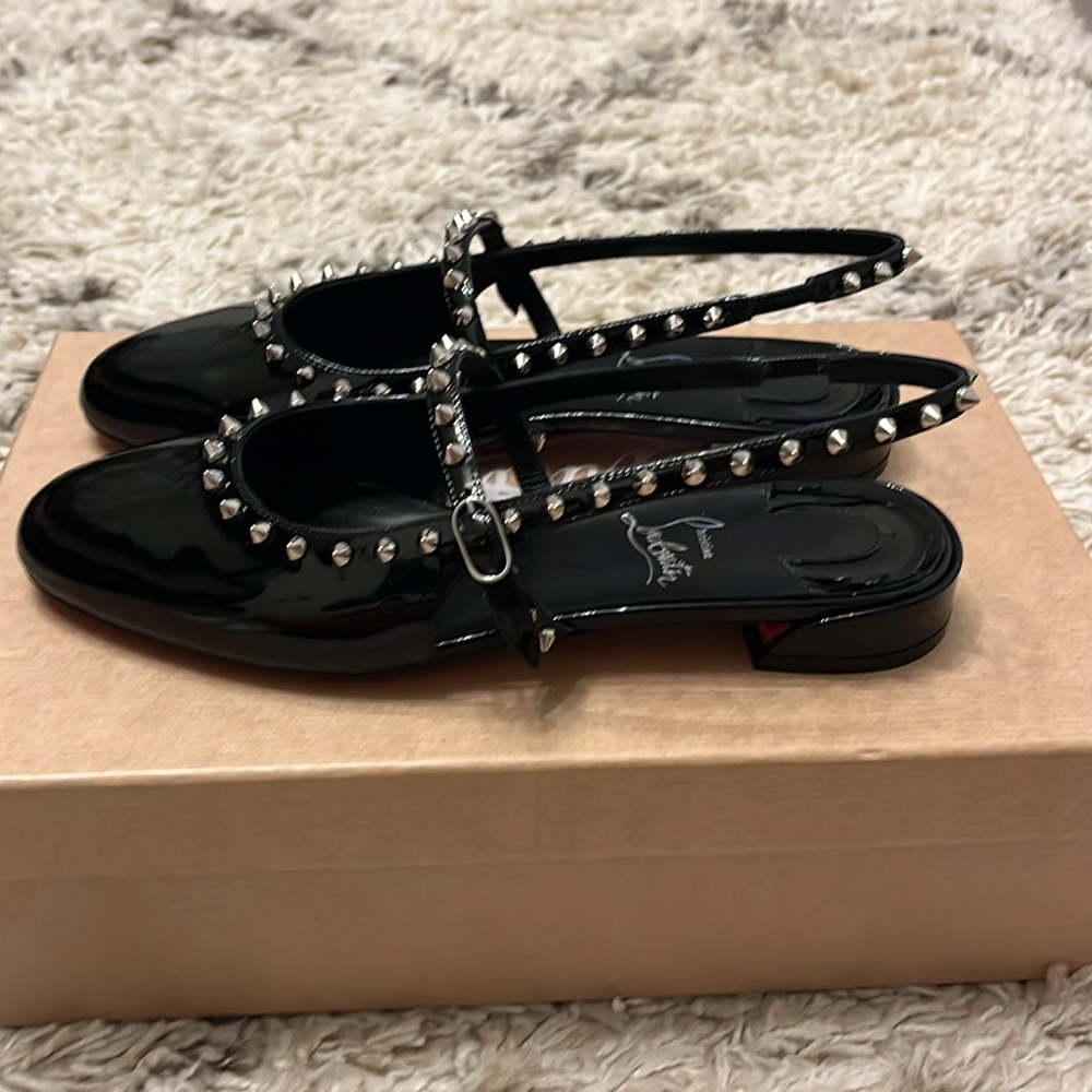 Christian Louboutin Sweet Janispikes flat. Patent. Black. Size 37. New in box.